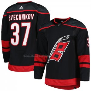 Camiseta Hockey Carolina Hurricanes Andrei Svechnikov Autentico Alterno Negro