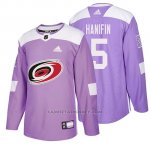 Camiseta Carolina Hurricanes Noah Hanifin Hockey Fights Cancer Violeta